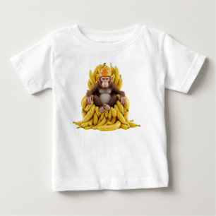 ロイヤルモンキー: 新鮮な果物の王座に座るチンパンジーの王様 ベビーTシャツ
