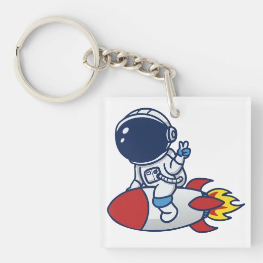 ロケットに乗った漫画の宇宙飛行士のイラスト キーホルダー (正面)