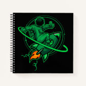 ロケット土星のアートワークのまわりにに搭乗する宇宙飛行士 | ノートブック (正面)