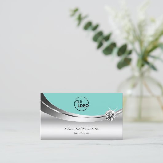 ロゴとダイヤモンドを使用したノーブルシルバーきらめくティール(緑がかった色) 名刺 (スタンド正面)