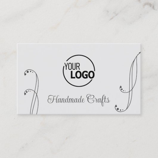 ロゴ付きライトグレー装飾品華美 名刺 (正面)