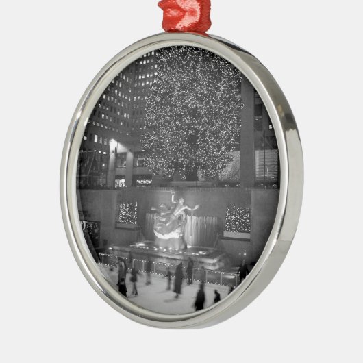 ロックフェラーの中心及びアイススケーターのクリスマス メタルオーナメント (左)