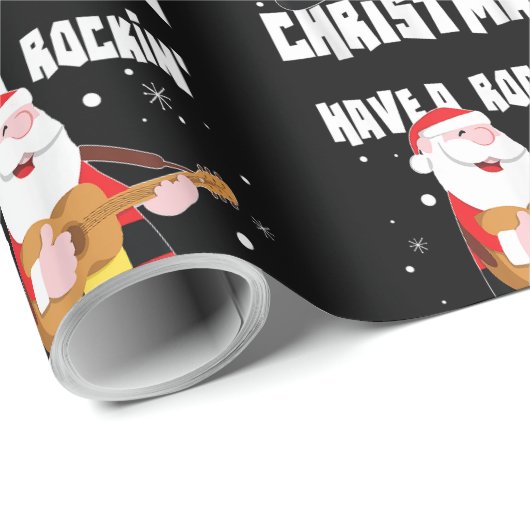 ロックンクリスマスギタリストのギターXmaをおもしろい持つ ラッピングペーパー (ロールコーナー)