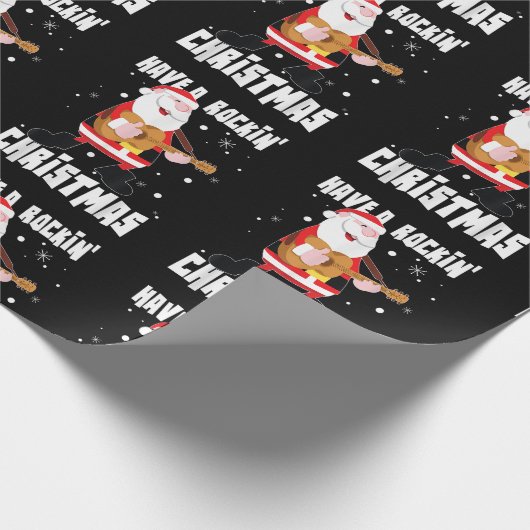 ロックンクリスマスギタリストのギターXmaをおもしろい持つ ラッピングペーパー (角)