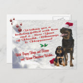 ロットワイラーのクリスマスの雪場面郵便はがき シーズンポストカード (正面/裏面)