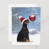 ロットワイラーの子犬が付いている冬休みの郵便はがき シーズンポストカード (正面/裏面)