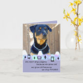 ロットワイラーの子犬の誕生日の挨拶 カード (黄色い花)