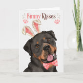 ロットワイラーの犬が復活祭のためにバニーの耳に シーズンカード (正面)