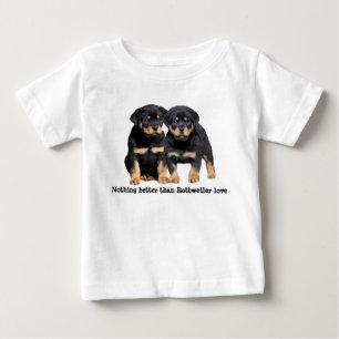ロットワイラーの相棒の幼児のユニセックスなワイシャツ ベビーTシャツ