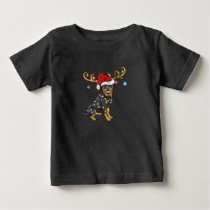 ロットワイラークリスマスギフトサンタスレインデアロットワイラー ベビーTシャツ