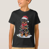 ロットワイラードッグサンタハットクリスマスツリーライトクリスマス Tシャツ (正面)