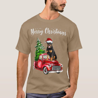 ロットワイラーライディングレッドトラックメリークリスマスドッグロー Tシャツ