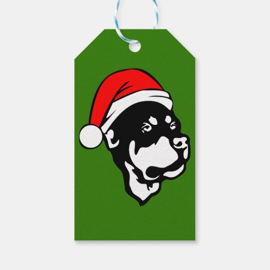 ロットワイラー犬が赤いクリスマスサンタハットを着て ギフトタグ (裏面)