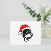 ロットワイラー犬が赤いクリスマスサンタハットを着て シーズンポストカード (スタンド正面)