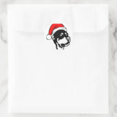 ロットワイラー犬が赤いクリスマスサンタハットを着て ラウンドシール (バッグ)