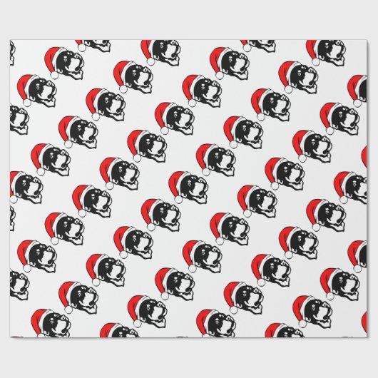 ロットワイラー犬が赤いクリスマスサンタハットを着て ラッピングペーパー (フラット)