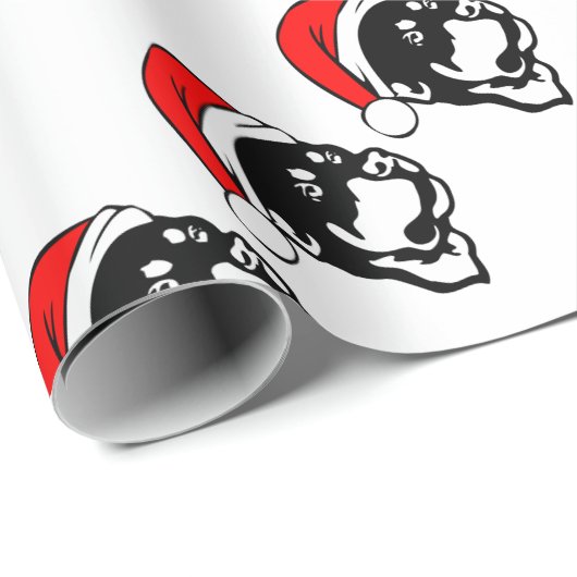 ロットワイラー犬が赤いクリスマスサンタハットを着て ラッピングペーパー (ロールコーナー)