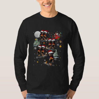ロットワイラー 犬 サンタクロース 月 クリスマスの面白グッズ Tシャツ