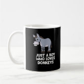 ロバおもしろいーが大好きな少年 コーヒーマグカップ (左)