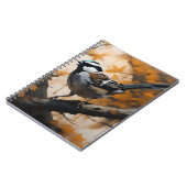 ロビンは木の油絵を描に入った。 ノートブック (左側)