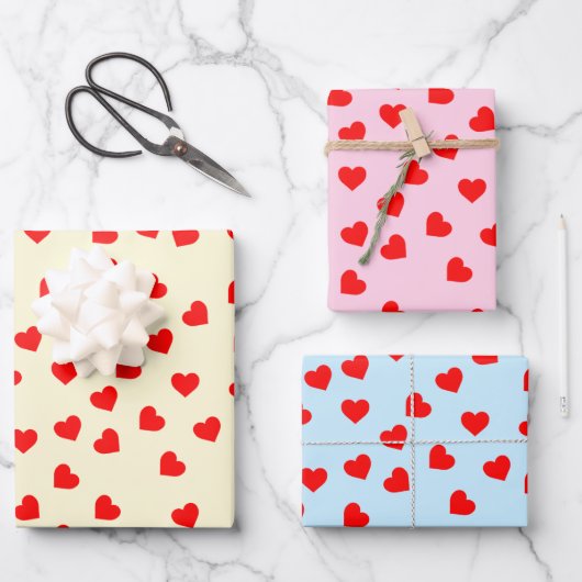 ロマンチックよくはしゃぐ赤いハートパターンパステル ラッピングペーパーシート (正面)