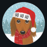 ロングフォールドダックスシャンドサンタクリスマスドカスタムッグ ラウンドシール<br><div class="desc">この愛らしいクリスマスダックスシャントのステッカーで休日の応援を広めろ！白いトリムで明るい赤い図解入りの、写真付きのサンタハットを着た長髪のダックスシュントがシールに特徴。HO HO HOは名前やパーソナライズされた他の文字で使用できる。この剥き取りシールは、休日の封筒やパッケージをカワイイでフェスティバルにシールするのに使用できる。Jenn's Doodle Worldより多くの犬好き製品やダックスフントの様々なクリスマスデザインをチェック。</div>