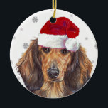 ロングヘアダックスシュント – Santa Hat Christmas Bauble セラミックオーナメント<br><div class="desc">あなたのぶら下がった品種を特徴とするラウンドセラミッお気に入りのクの装飾！フェスティバルシーンの美しいフェスティバルとスポーツのふわふわのサンタハットの豪華なシェード赤のロングヘアDachshandは、クリスマスの木の上でぶら下がったの完璧な！アンバー・マリー・スタジオでは種離れ類はない。私のもし店で紹介されたあなたの品種を見ていない、私は何兆ものデザインを持っているので知らせなさい！</div>