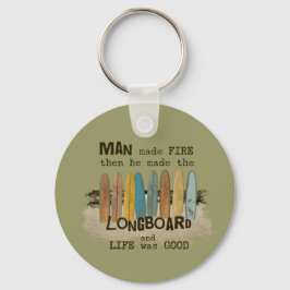 ロングボードを持つ初期の男性サーフィンユーモア キーホルダー