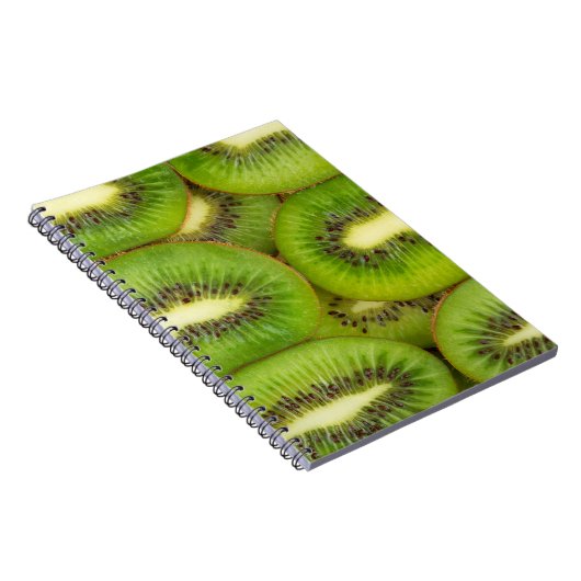 ローズブラウンの新鮮で熟したキウイの果実のスライス，c ノートブック (右側)