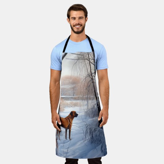 ローデシアンのリッジバックそれを雪のクリスマスに エプロン (着用した状態)