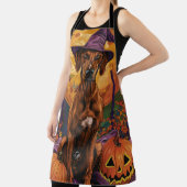 ローデシアンのリッジバックドッグハロウィンウィッチカボチャ エプロン (インサイチュ)