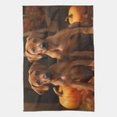 ローデシアンのリッジバックパピーオータムデライトカボチャ キッチンタオル (縦)