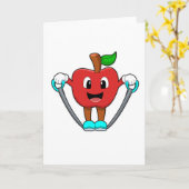 ロープを使ったフィットネスをするApple カード (黄色い花)