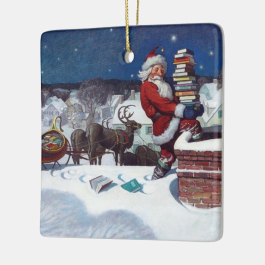 ワイエスによる書籍のアームロードを提供するサンタ セラミックオーナメント (左)