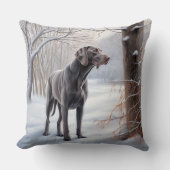 ワイマラーは雪のクリスマスを手放した クッション (正面)