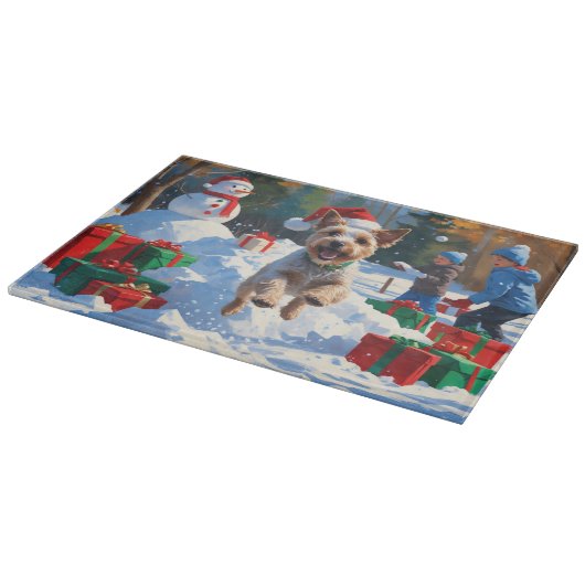 ワイヤーキツネテリア走ーのクリスマス帽子と雪 カッティングボード (角)
