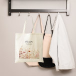 ワイルドフラワーピンクのベージュの花嫁 トートバッグ<br><div class="desc">透明な背飾景。ピンクとベージュのワイルドフラワー。花嫁の名前をカスタマイズして追加する。戻る：デザインなし</div>