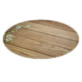 ワイルドフラワー、ハーブ:木製の背景。 カッティングボード (角)