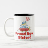 ワゴン誇り高く新しい姉妹それは男の子です ツートーンマグカップ (左)