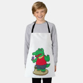 ワニと花 エプロン (着用した状態)