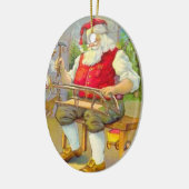 ワークショップでのヴィンテージクリスマスサンタクロース セラミックオーナメント (左)