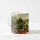 ヴィンセント・ヴァン・ゴッホの「オリーブの森、淡い青空」 コーヒーマグカップ (正面左)