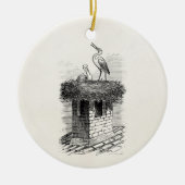 ヴィンテージのこうのとりの鳥の巣の鳥のアンティークのテンプレート セラミックオーナメント (正面)