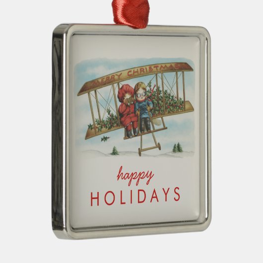 ヴィンテージのクリスマスのヒイラギのかわいい子供の飛行機の休日 メタルオーナメント (右)