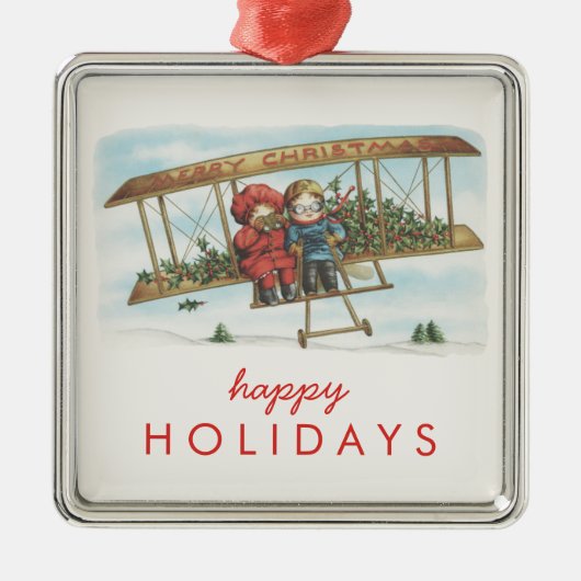 ヴィンテージのクリスマスのヒイラギのかわいい子供の飛行機の休日 メタルオーナメント (正面)