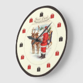 ヴィンテージのクリスマスの時計-トナカイにIつを食べ物を与えているサンタ ラージ壁時計 (傾斜)