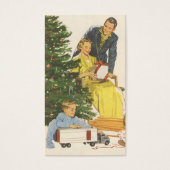 ヴィンテージのクリスマスの朝、家族でプレゼントを開ける (正面)