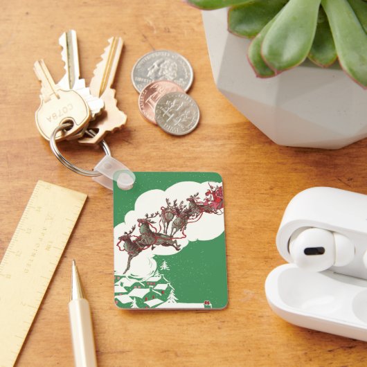 ヴィンテージのクリスマスイブ、レトロなサンタクロースのソリ キーホルダー (デスク)