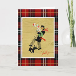 ヴィンテージのクリスマステリア犬とギフトを持った男 シーズンカード