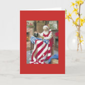 ヴィンテージのクリスマス-米国旗を縫っているサンタ カード (黄色い花)